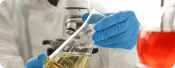 Scientist working with microscope