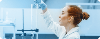 Scientist working with microscope